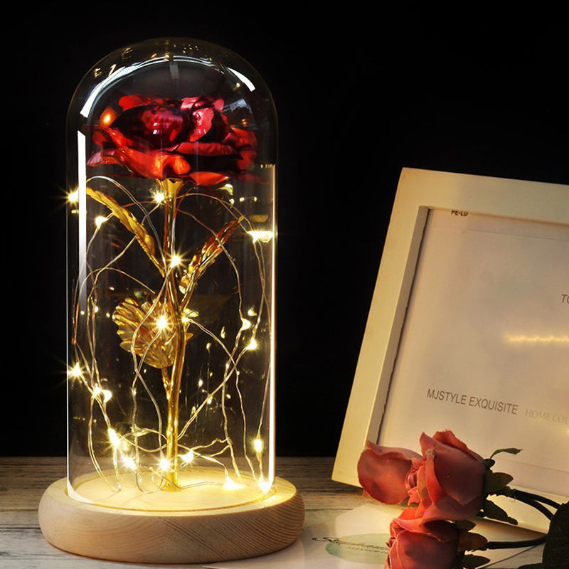 Enchanted Rose in a Glowing Glass Capsule